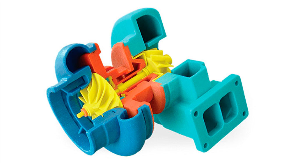 Процес Material Jetting: Друкувальна голівка наносить краплі фотополімеру