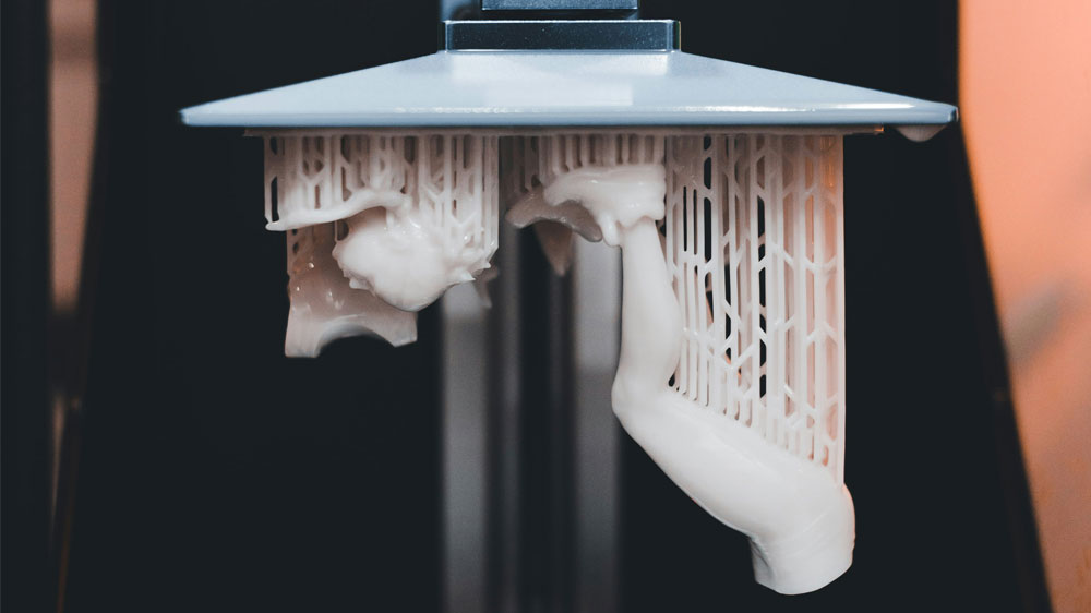 Процес SLA/DLP 3D-друку: УФ-світло затверджує фотополімерну смолу